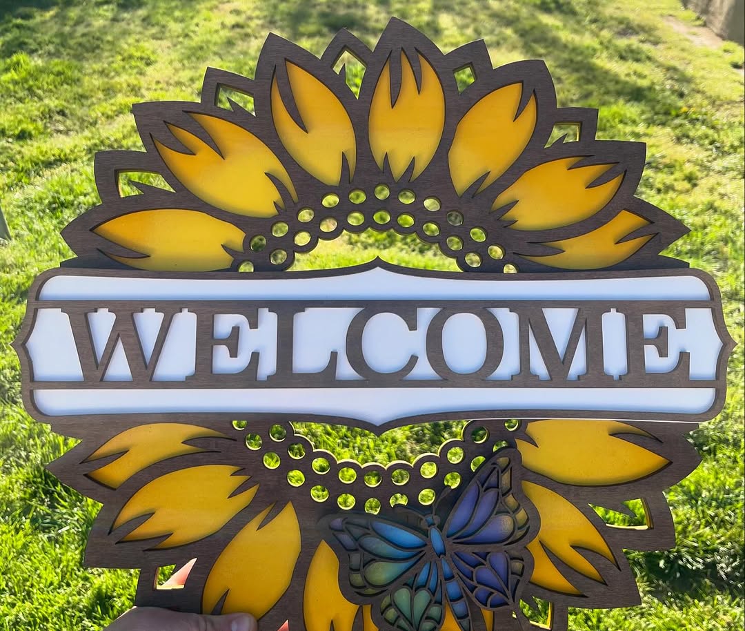 Sunflower welcome signs, layered and laser cut. The centerpiece for a front door.